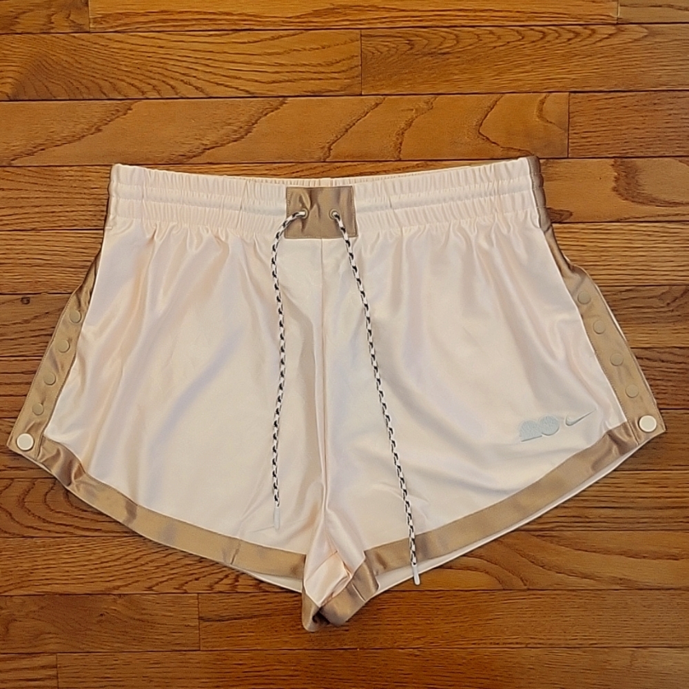 Nike Pink and Gold Athletic Shorts Lightweight Design